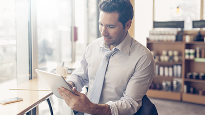 Young businessman working on a tablet