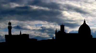 Silhouette of a skyline in front of a cloudy sky